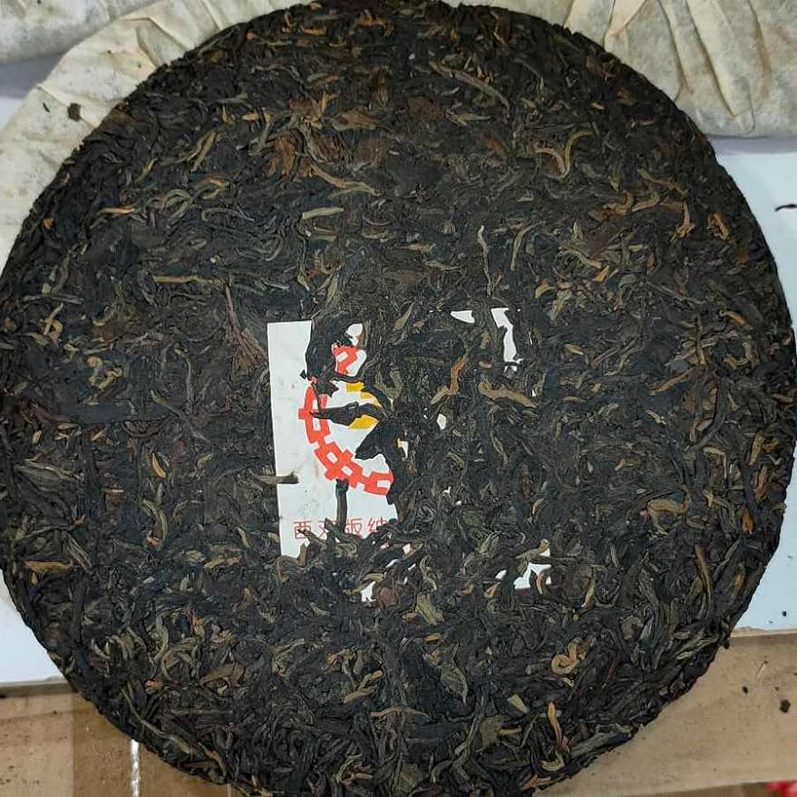 Pu-erh tea,Late 1990s,Hong Kong customization Orange Flying Seal-Little Yellow Seal,357g,Raw