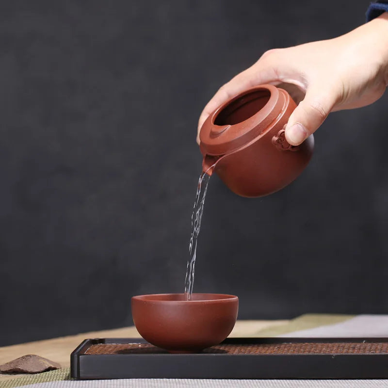 A pot of a cup of yixing purple sand cup single crack cup kung fu office travel cup tea masters cup