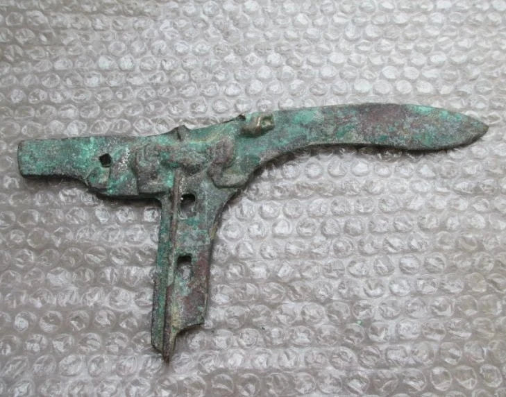 Ancient Chinese bronze statue of a sword ancient characters