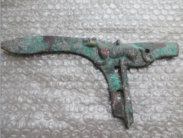 Ancient Chinese bronze statue of a sword ancient characters