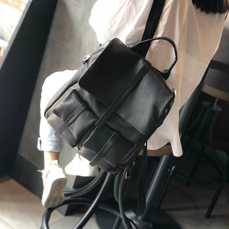 Autumn and winter new solid color large bag casual men and women general first layer cowhide backpack travel backpack