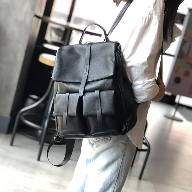Autumn and winter new solid color large bag casual men and women general first layer cowhide backpack travel backpack