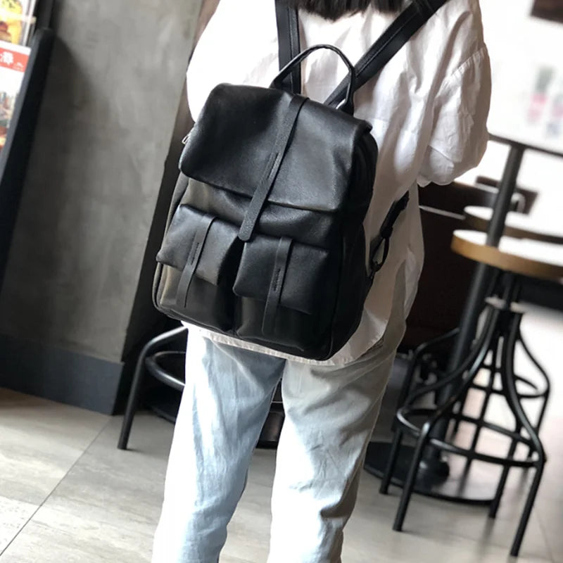 Autumn and winter new solid color large bag casual men and women general first layer cowhide backpack travel backpack