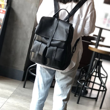Autumn and winter new solid color large bag casual men and women general first layer cowhide backpack travel backpack