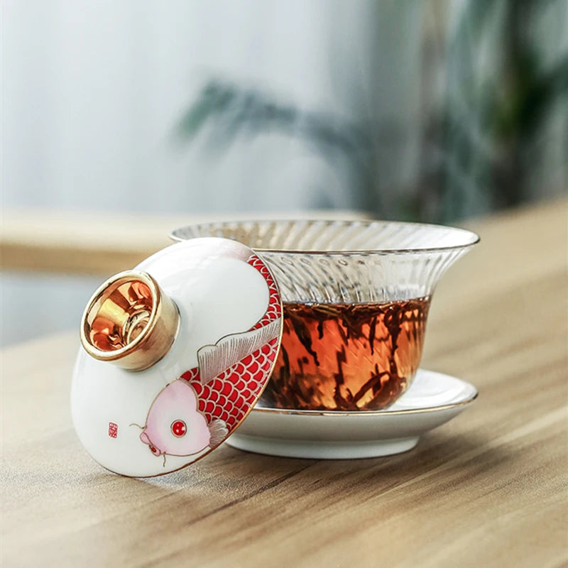 Borosilicate glass cup bowl set Chinese porcelain tureen gaiwan cup saucer lid fish print clear cup bowls in China