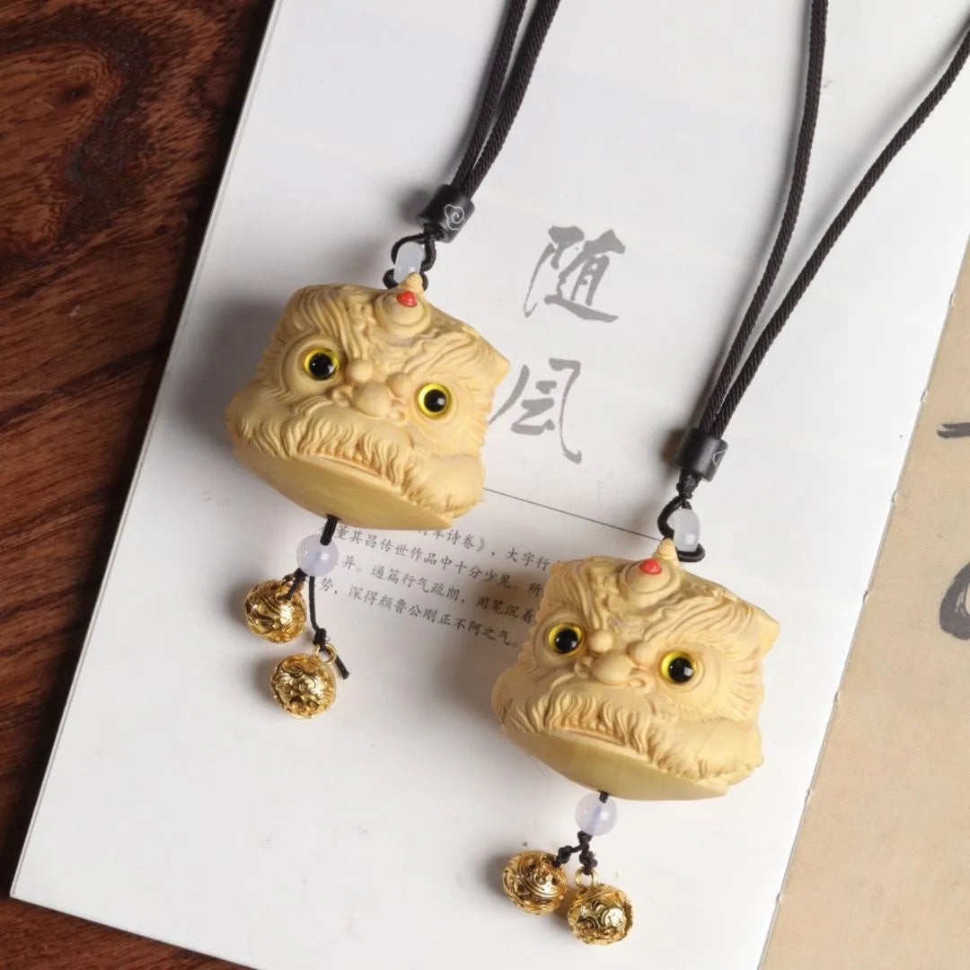 Boxwood carving awakens lion head China-Chic decoration handlebar car pendant auspicious animal mythical wild animal pendant
