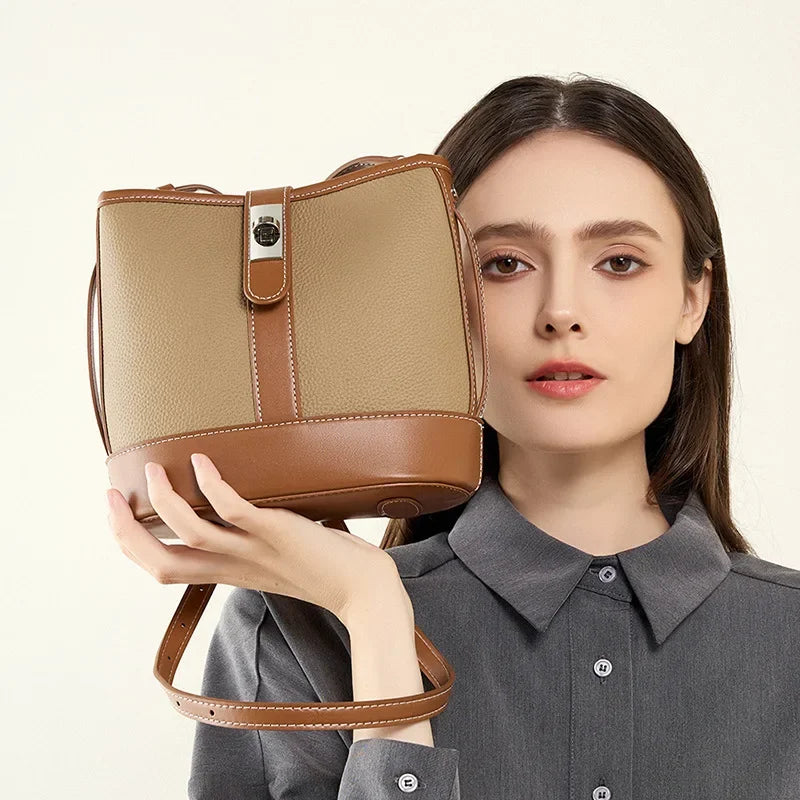 Bucket bag for women's new 2024 popular top layer leather women's bag, cowhide niche design, handheld commuting crossbody bag