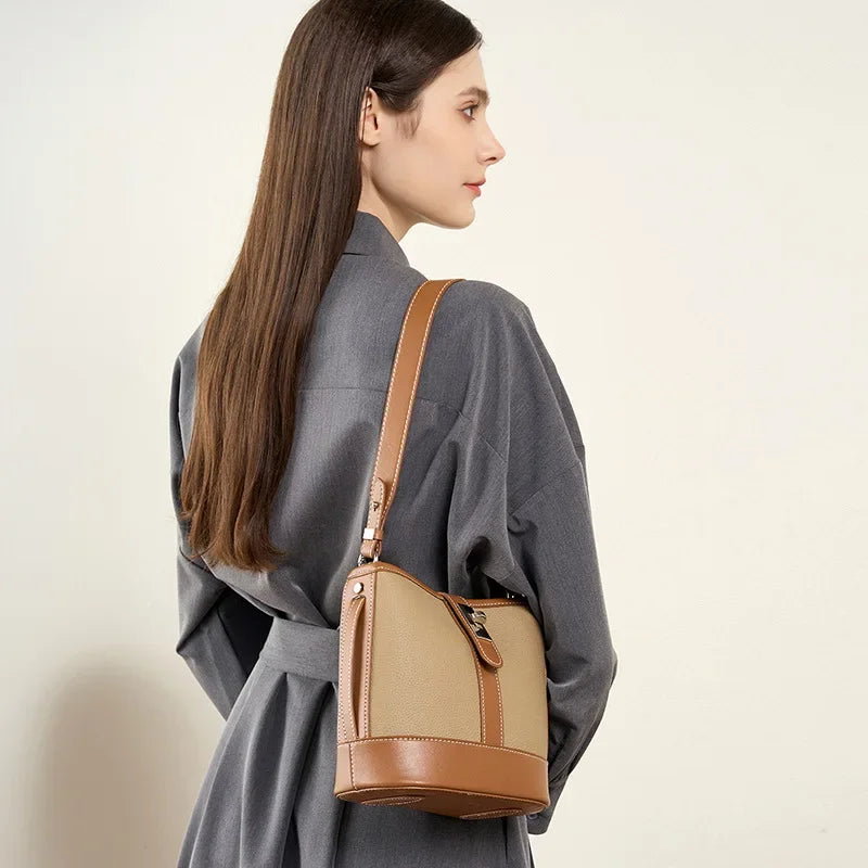 Bucket bag for women's new 2024 popular top layer leather women's bag, cowhide niche design, handheld commuting crossbody bag