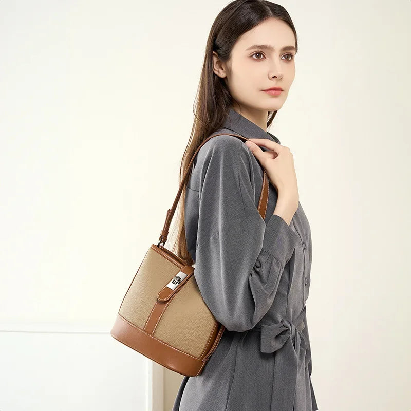 Bucket bag for women's new 2024 popular top layer leather women's bag, cowhide niche design, handheld commuting crossbody bag
