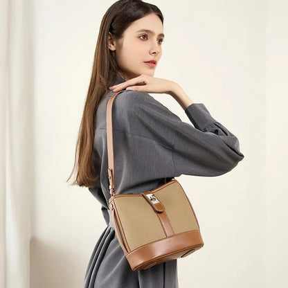 Bucket bag for women's new 2024 popular top layer leather women's bag, cowhide niche design, handheld commuting crossbody bag