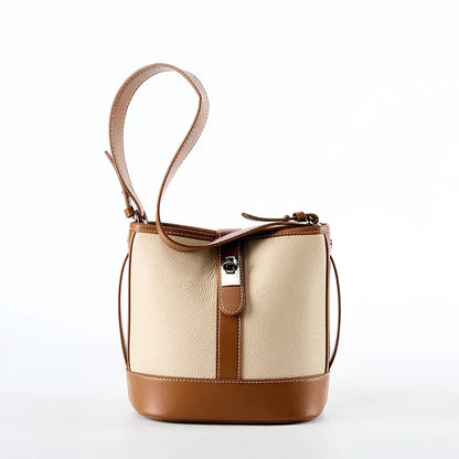 Bucket bag for women's new 2024 popular top layer leather women's bag, cowhide niche design, handheld commuting crossbody bag