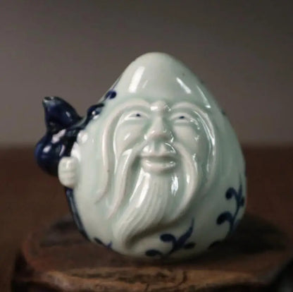 China Blue and white ceramic longevity Buddha small crafts statue