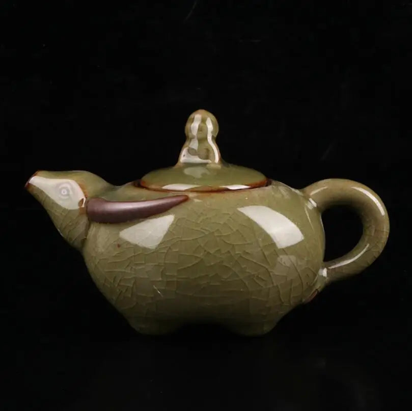 China Cyan glaze ceramic shepherd boy ride cow teapot crafts statue