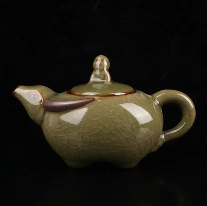 China Cyan glaze ceramic shepherd boy ride cow teapot crafts statue