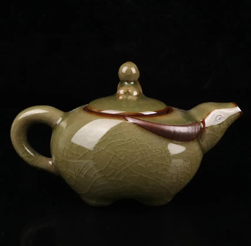 China Cyan glaze ceramic shepherd boy ride cow teapot crafts statue