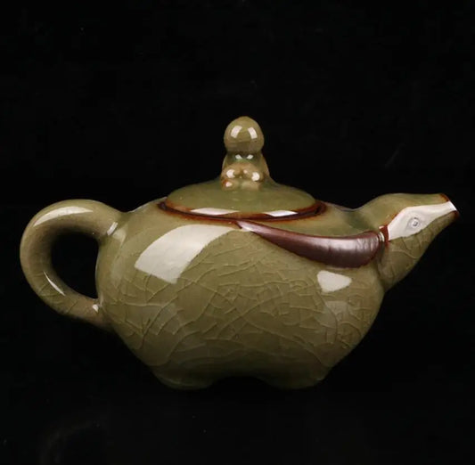 China Cyan glaze ceramic shepherd boy ride cow teapot crafts statue