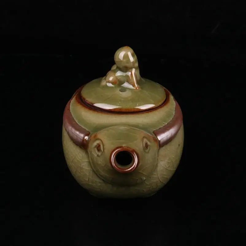 China Cyan glaze ceramic shepherd boy ride cow teapot crafts statue