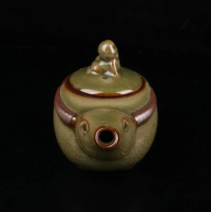 China Cyan glaze ceramic shepherd boy ride cow teapot crafts statue