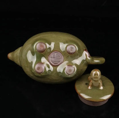 China Cyan glaze ceramic shepherd boy ride cow teapot crafts statue