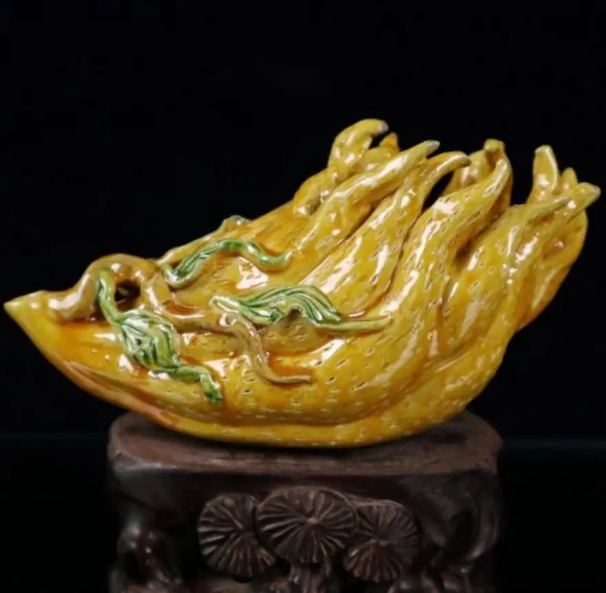 China Yellow glaze ceramic Buddha hand pen wash crafts statue