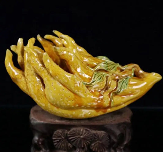 China Yellow glaze ceramic Buddha hand pen wash crafts statue