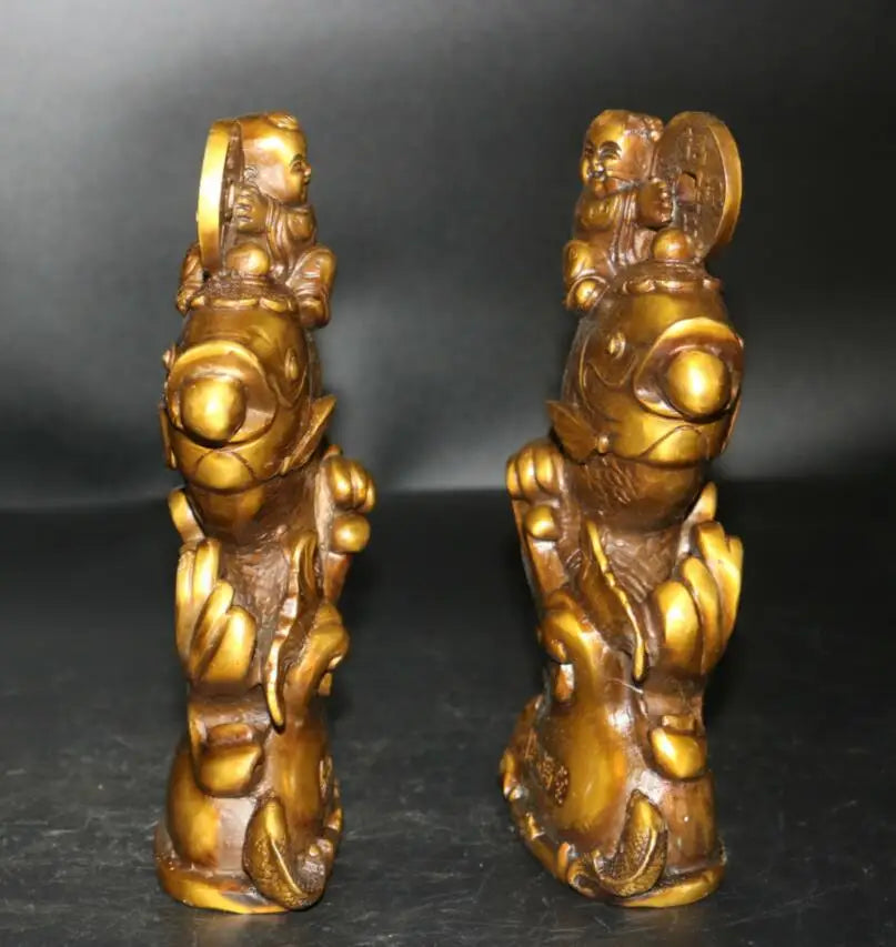 China brass boy and Girl riding  fish wealth statue