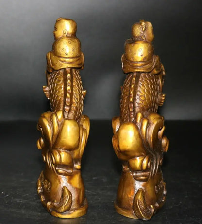 China brass boy and Girl riding  fish wealth statue