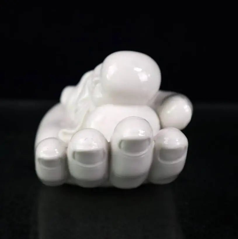 China seiko White glaze ceramic Buddha hand palm small monk crafts statue