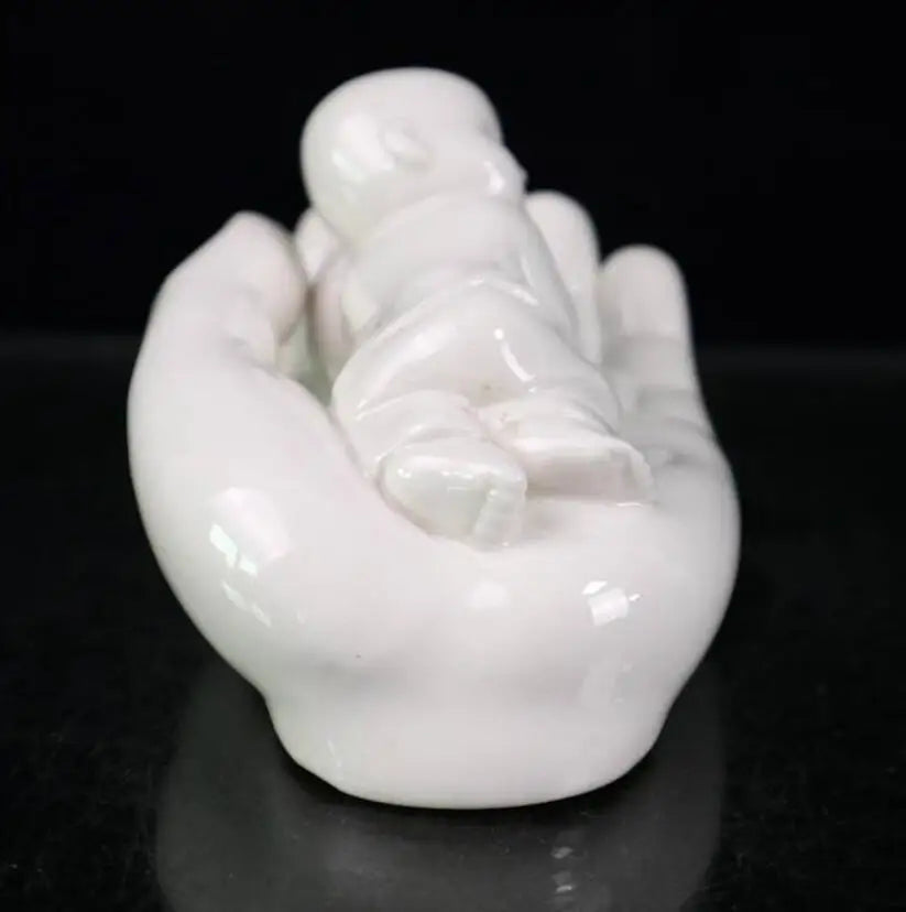 China seiko White glaze ceramic Buddha hand palm small monk crafts statue