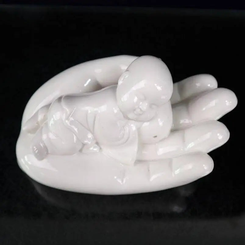 China seiko White glaze ceramic Buddha hand palm small monk crafts statue