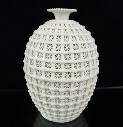 China seiko White glazed ceramic Hollow out vase crafts statue