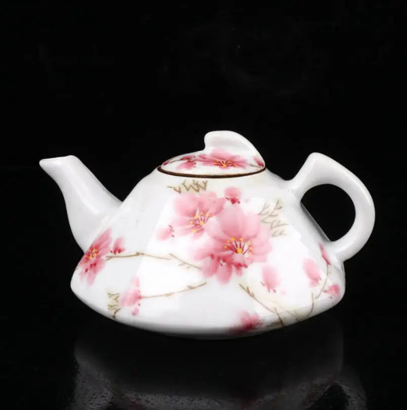 China seiko White glazed ceramic peach blossom teapot crafts statue