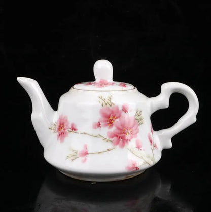 China seiko White glazed ceramic peach blossom teapot crafts statue
