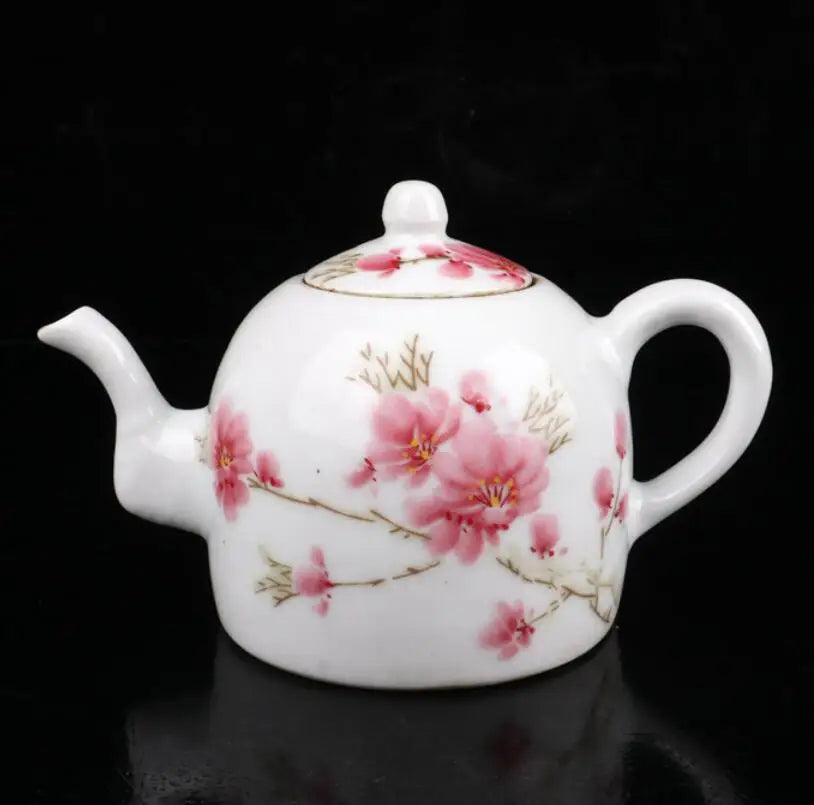 China seiko White glazed ceramic peach blossom teapot crafts statue