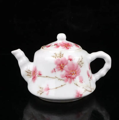 China seiko White glazed ceramic peach blossom teapot crafts statue