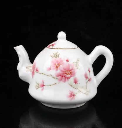 China seiko White glazed ceramic peach blossom teapot crafts statue