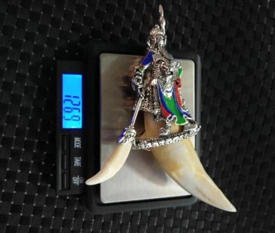 Chinese Antique Tibetan silver Guan Gong pan long dog tooth pendant