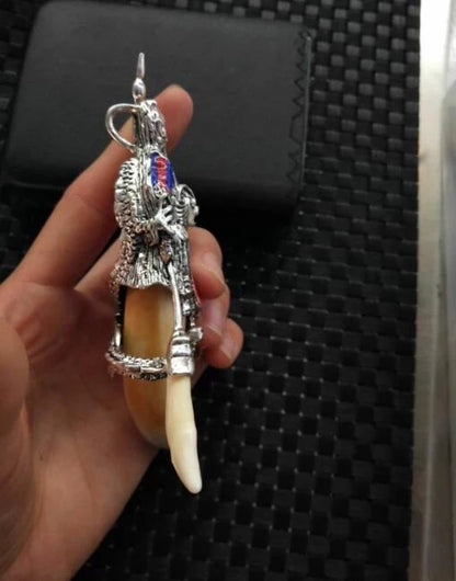 Chinese Antique Tibetan silver Guan Gong pan long dog tooth pendant