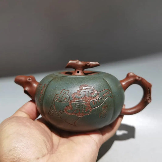 Chinese Yixing Zisha Clay Teapot  Double color persimmon flat pot produced by Yixing 200ml