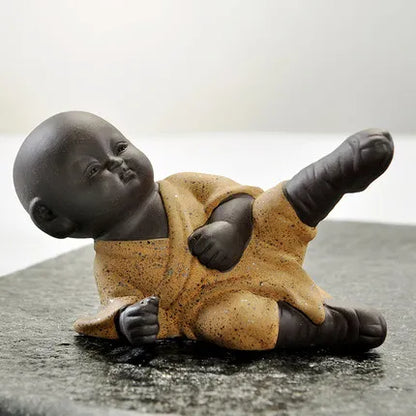 Chinese kungfu boy tea pet creative purple clay tea pet table decoration yixing zisha tea play monk statue small size posture