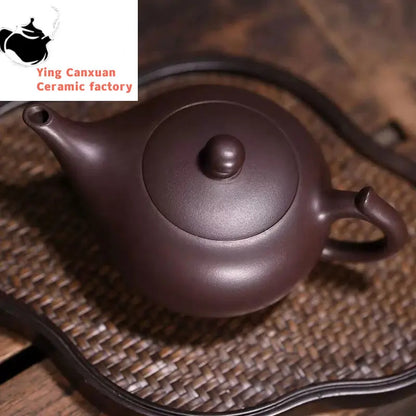 Chinese teapot Yixing purple clay pot raw ore purple clay magic lamp pot Kung Fu tea set Chinese teapot capacity 220ml