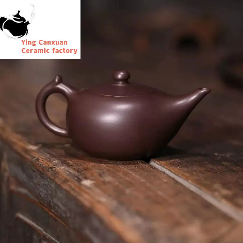 Chinese teapot Yixing purple clay pot raw ore purple clay magic lamp pot Kung Fu tea set Chinese teapot capacity 220ml