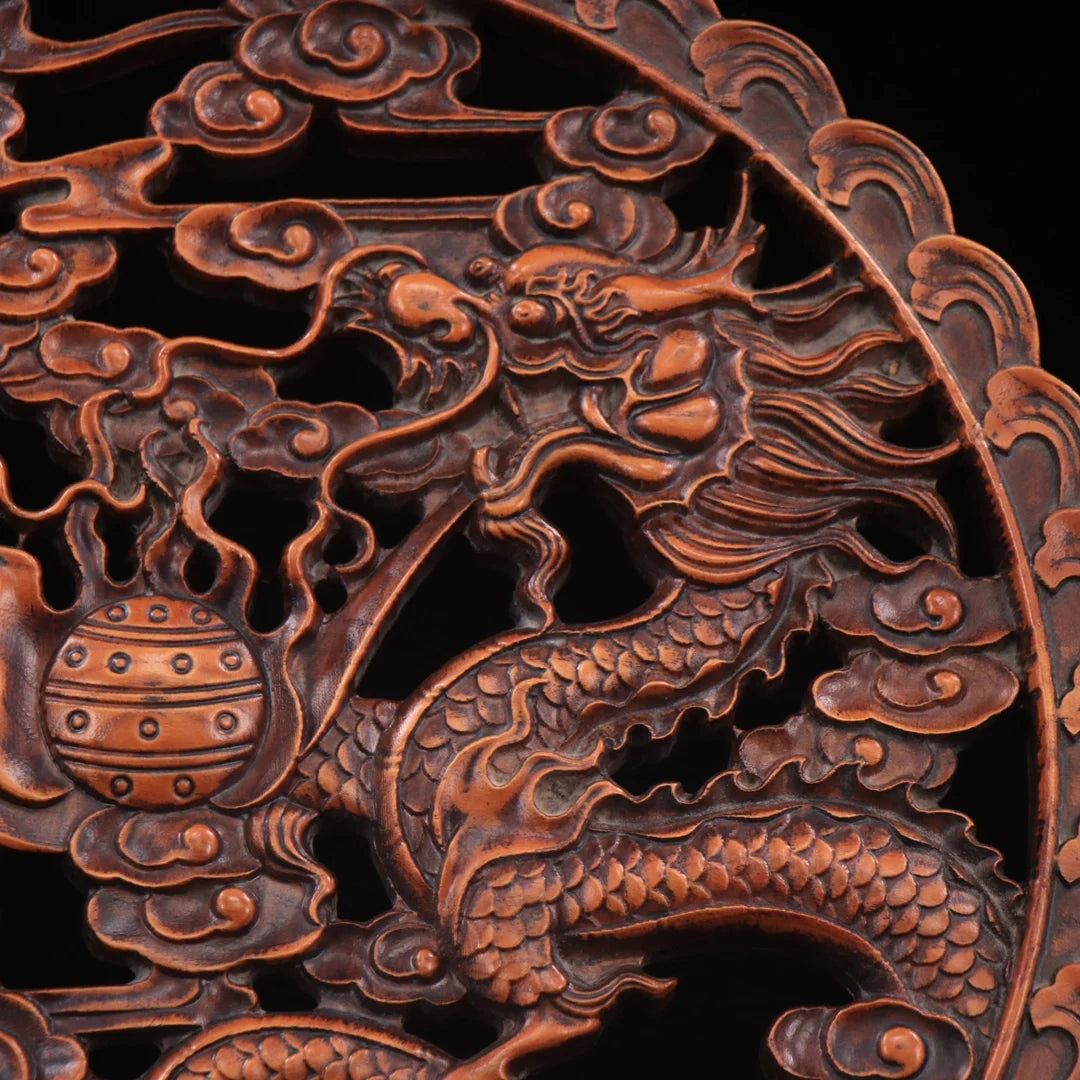 Collection of boxwood hand-carved double dragon play beads plaque