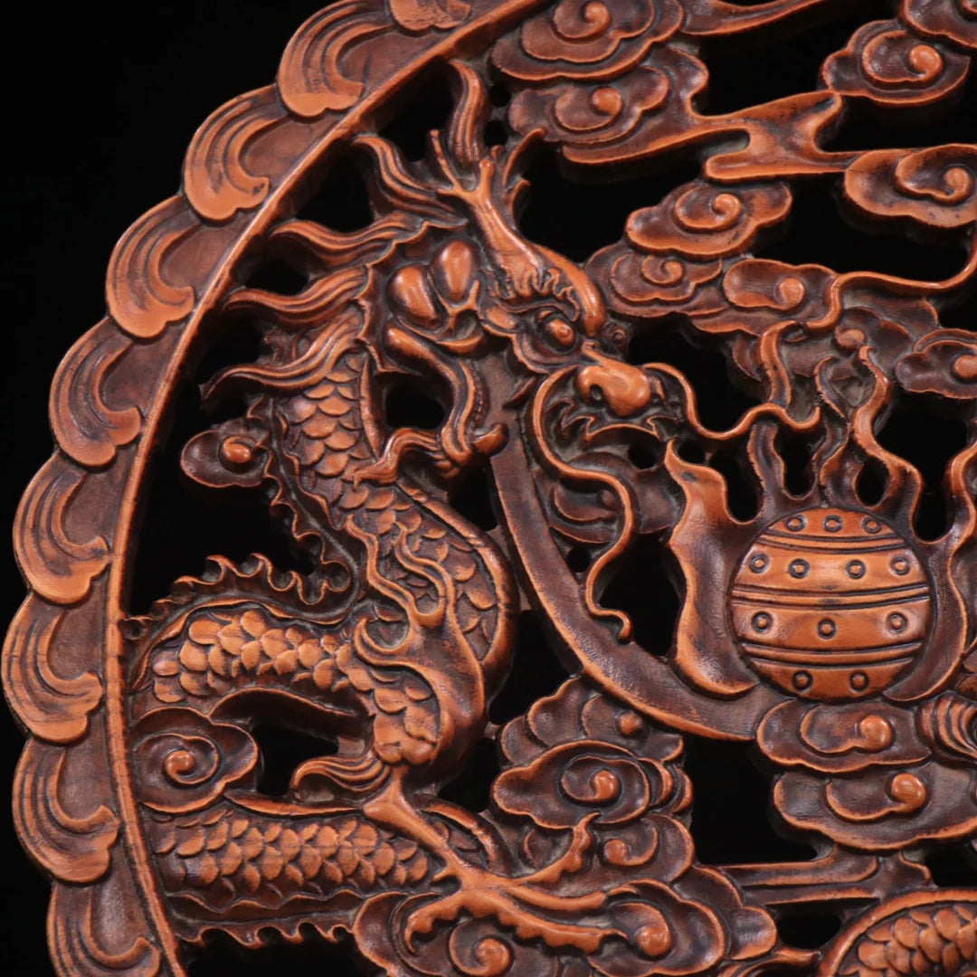 Collection of boxwood hand-carved double dragon play beads plaque