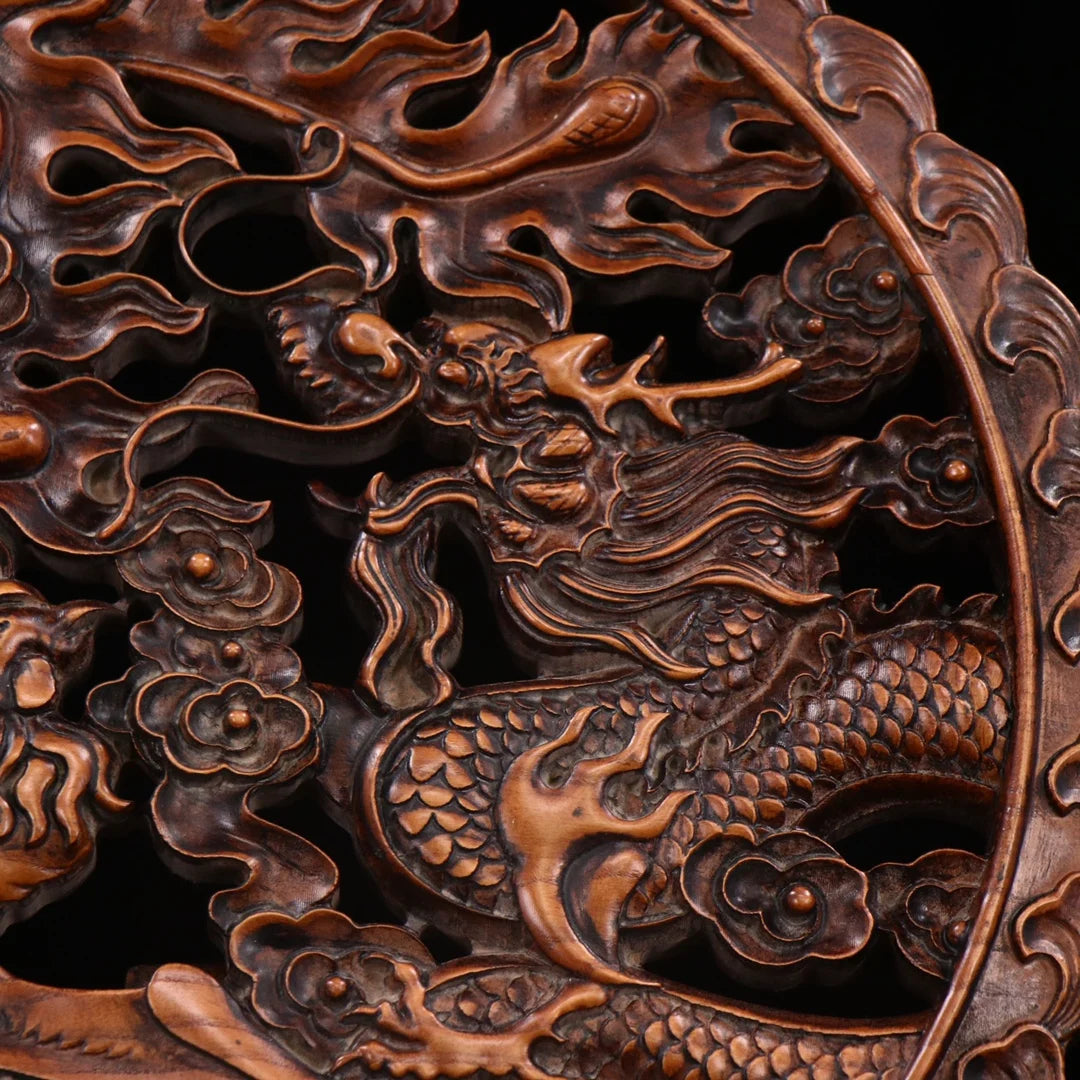 Collection of boxwood hand-carved dragon and phoenix interstitial.
