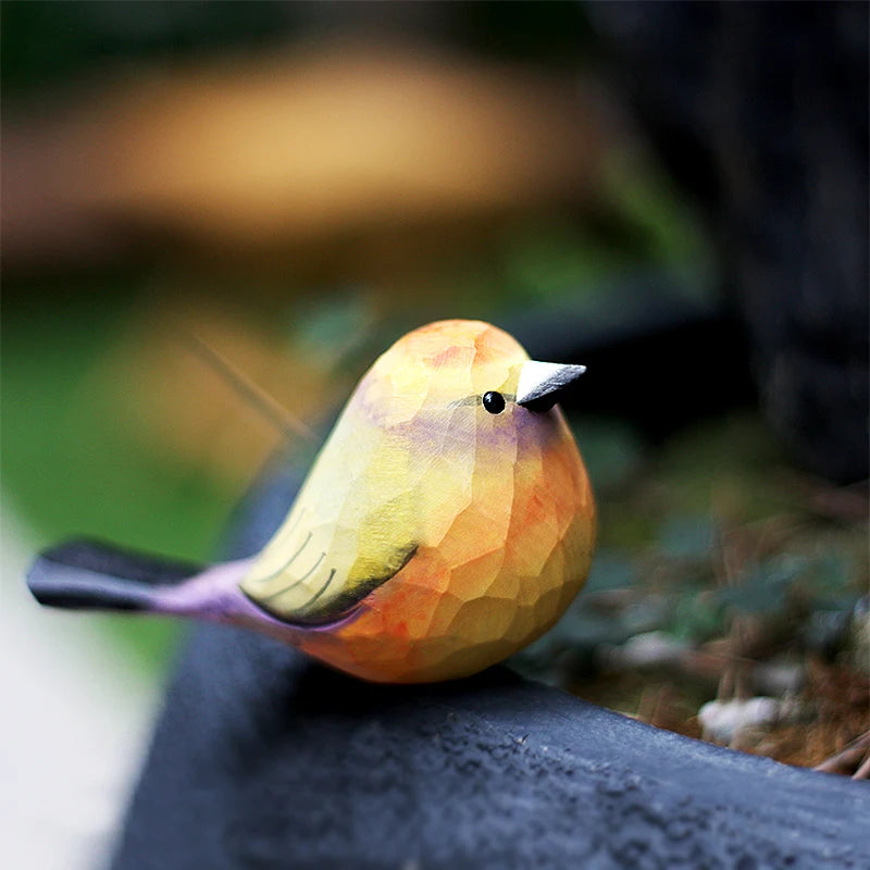 Colorful birds and warblers playing with wooden carved birds, small chubby birds, pure handmade solid wood tabletop ornaments