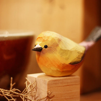 Colorful birds and warblers playing with wooden carved birds, small chubby birds, pure handmade solid wood tabletop ornaments