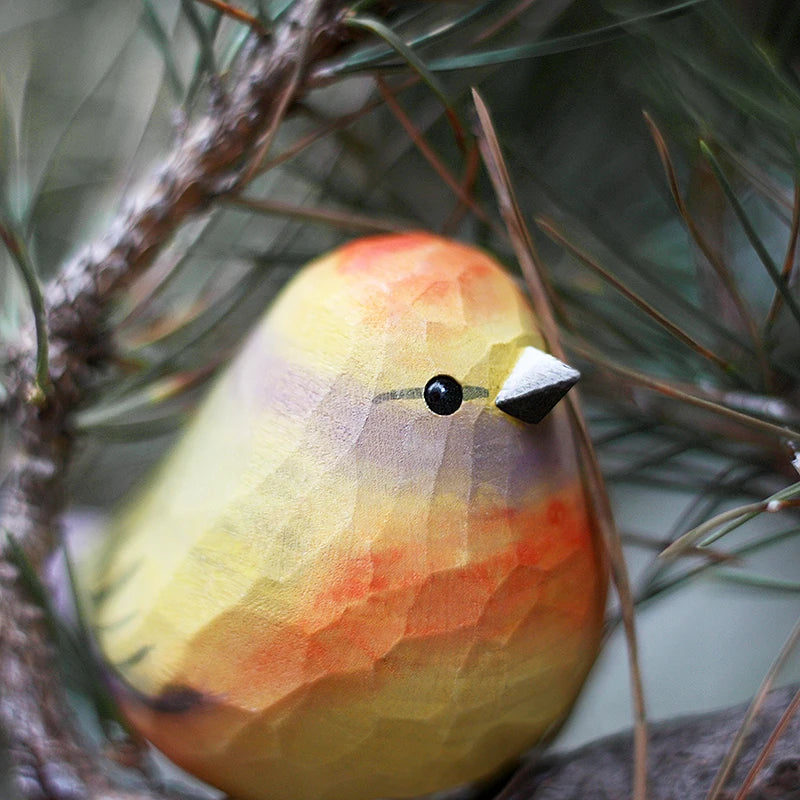 Colorful birds and warblers playing with wooden carved birds, small chubby birds, pure handmade solid wood tabletop ornaments