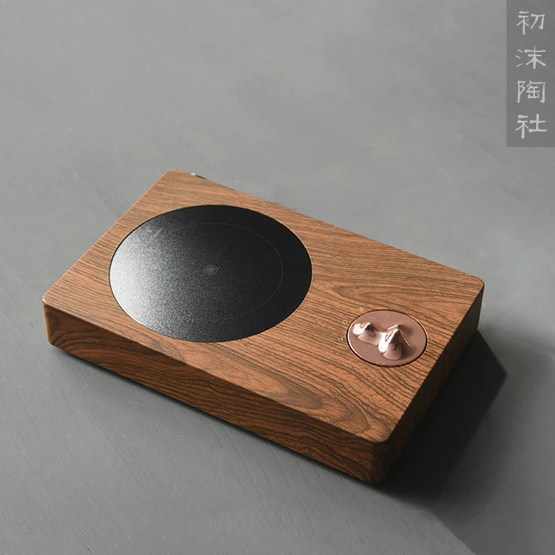Concept of foam at the beginning of the three mountain electric TaoLu tea stove boiling tea stove tea mini tea tea set