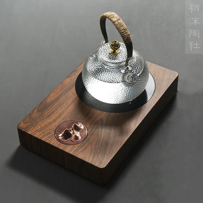 Concept of foam at the beginning of the three mountain electric TaoLu tea stove boiling tea stove tea mini tea tea set